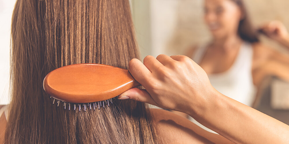 Girl Brushing Hair